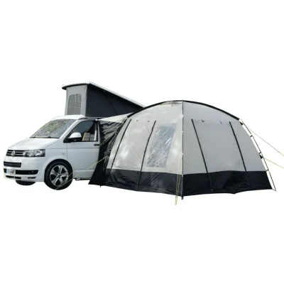 Isolated view of Olpro poled drive-away awning connected to a white van