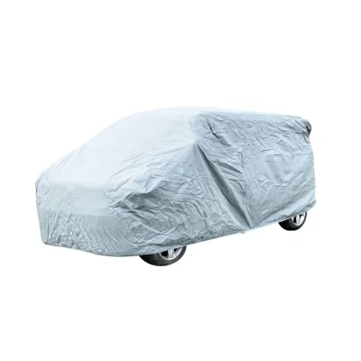 Studio shot of a grey OLPRO breathable campervan cover fitted on a VW Transporter, showing the elasticated hem and full-vehicle protection against winter weather.
