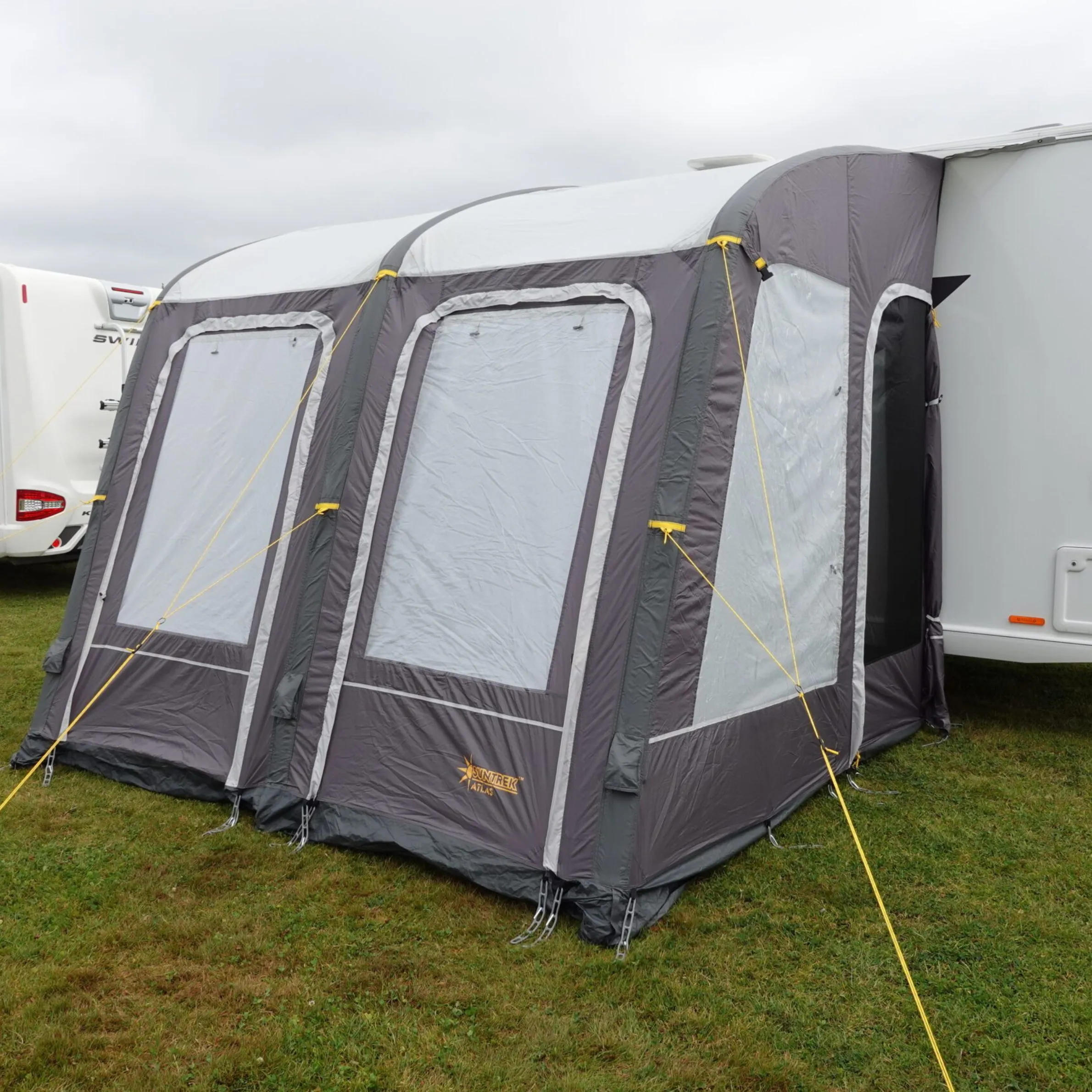 The Atlas represents a clever evolution in awning design by utilizing a hybrid support system.